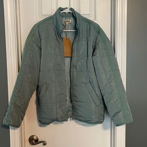 Green quilted puffer jacket
